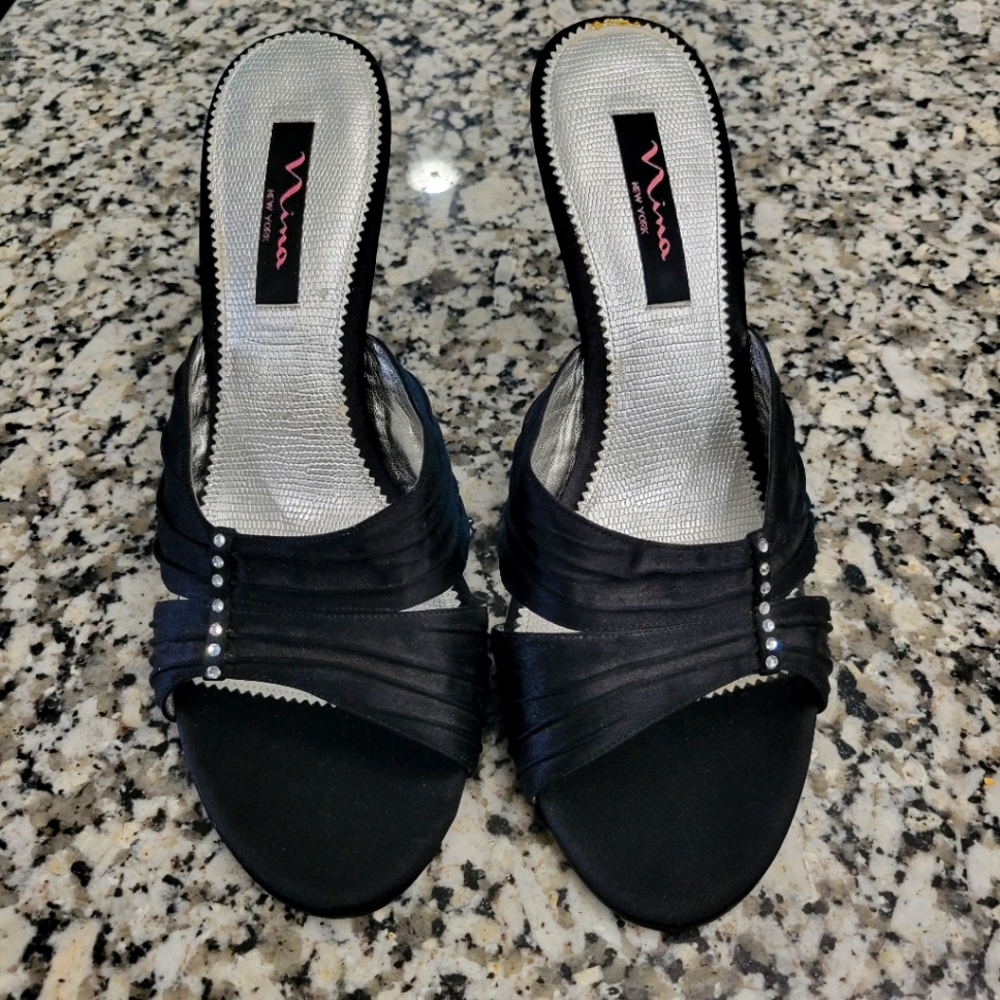 Size 10M Nina New York black open toe pumps with 4 inch heels.